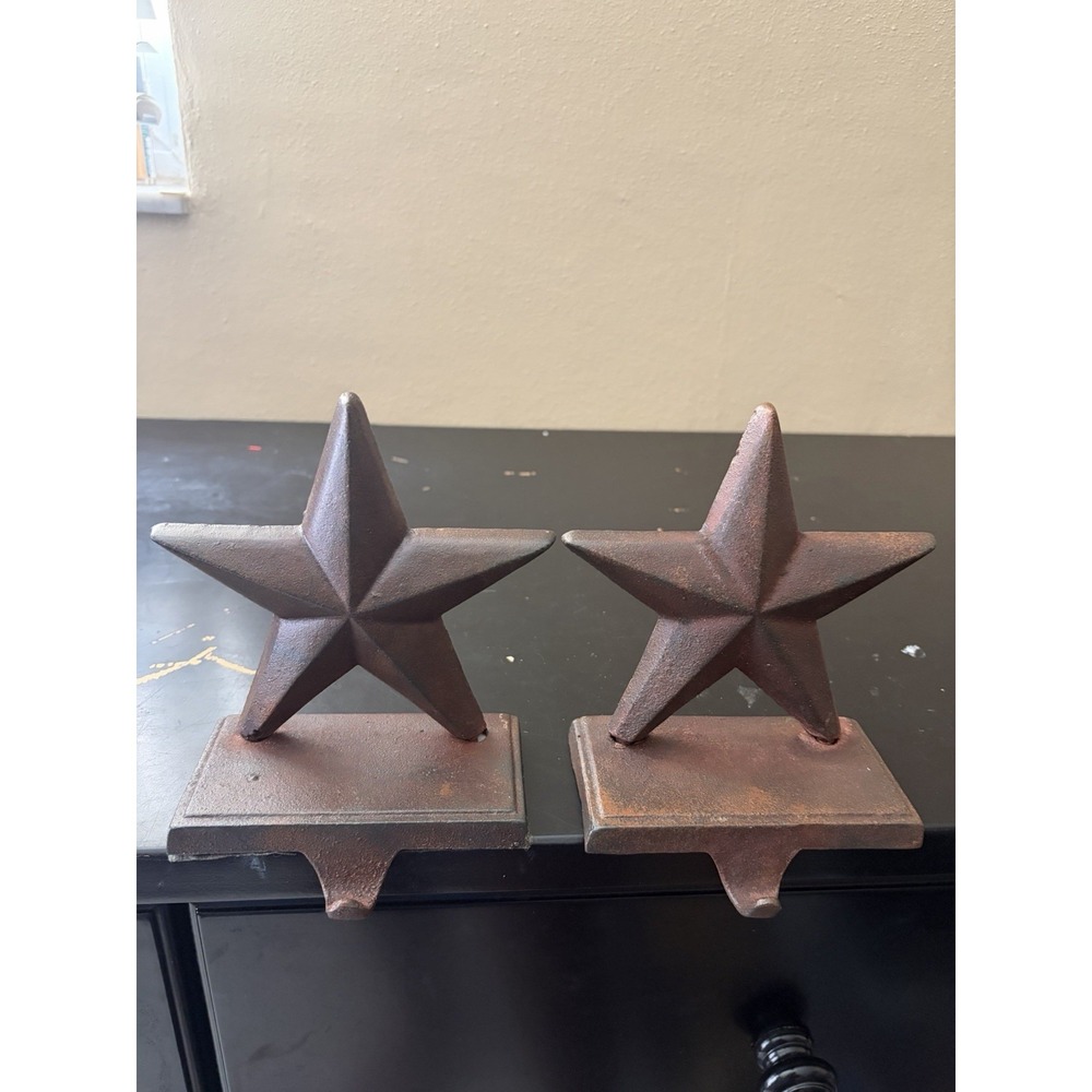 cast iron star stocking holders pair rustic farmhouse christmas mantel deco